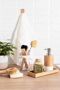 Home cleaning non toxic, natural products. Washing dishen in kitchen with olive oil soap and brushes. Plastic free, zero waste, sustainable lifestyle idea